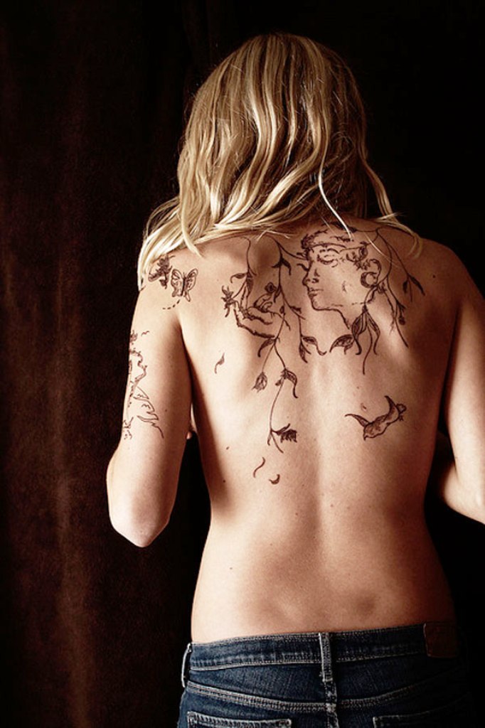 10 Ideas About Small Back Tattoos For Women  Flawssy
