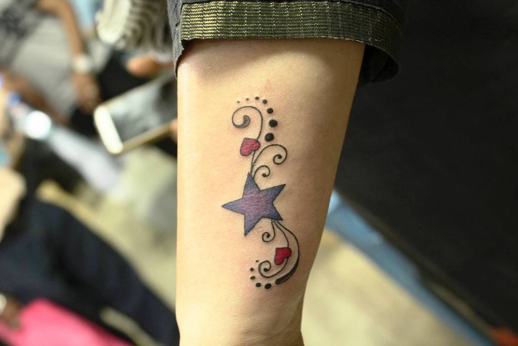 10. Symbolic Tattoos for Women - wide 11