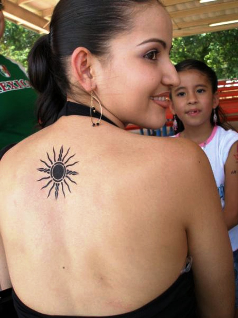  10 Amazing Sun Tattoo Designs For Women - Flawssy