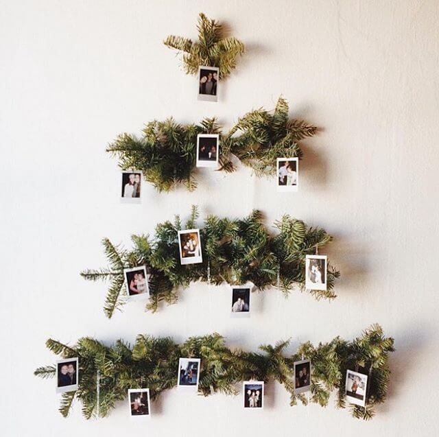 A Christmas tree with Polaroids (1)