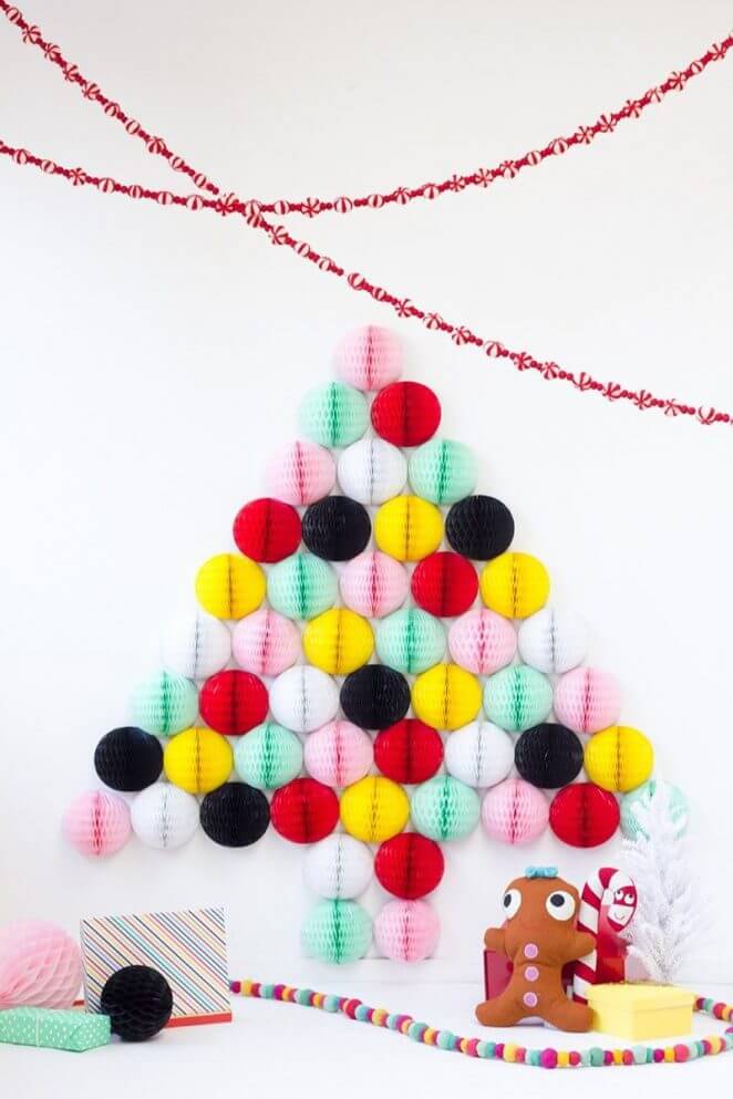 A harlequin Christmas tree made from pompoms 