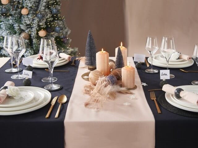 An elegant holiday table in blue and pink