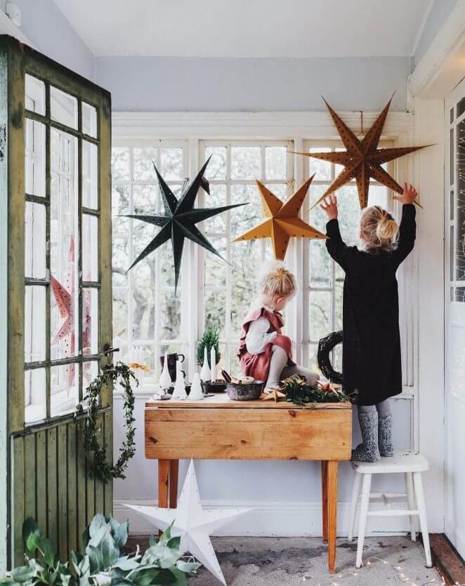 Large colored stars hanging from the windows (1)