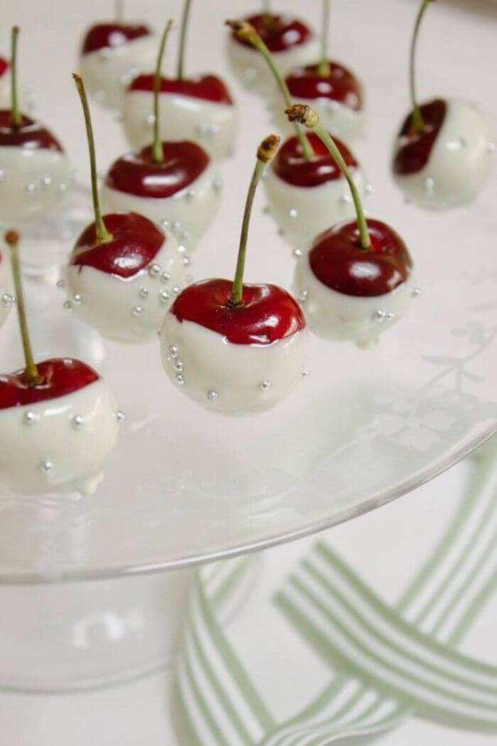 Cherries coated with white chocolate as a thematic dessert and edible decoration (1)