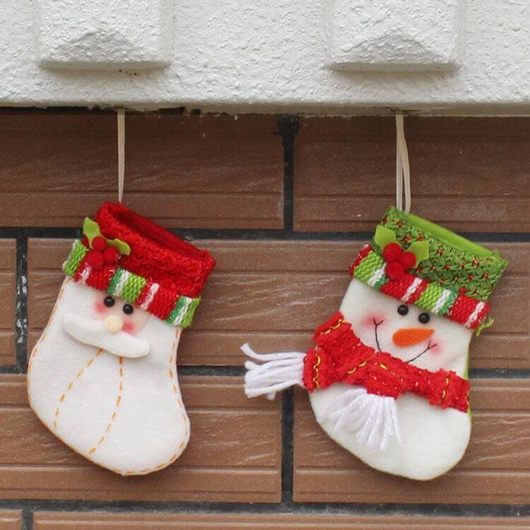 Christmas felt socks in the shape of a snowman and Santa Claus (1)