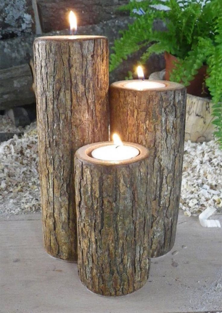 Create outdoor decorative candlesticks with logs