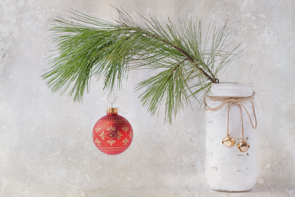 Decorate with spruce branch and a red ball (1)