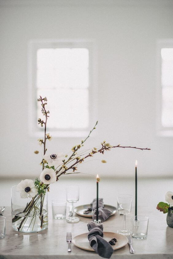 Flowers slipped into the water brighten up the table 