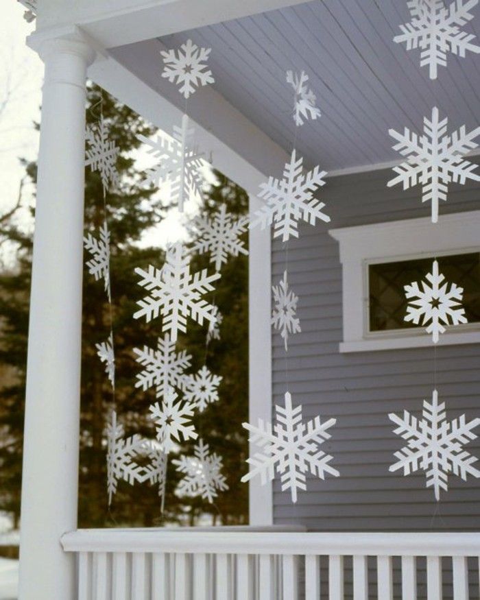 Hang paper garlands to embellish your porch at Christmas time-