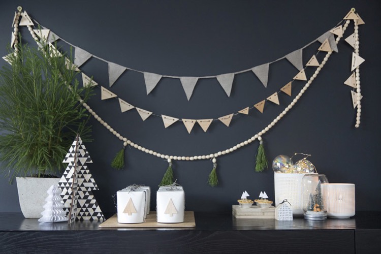 Nordic style Christmas decoration in white, gray, and wood