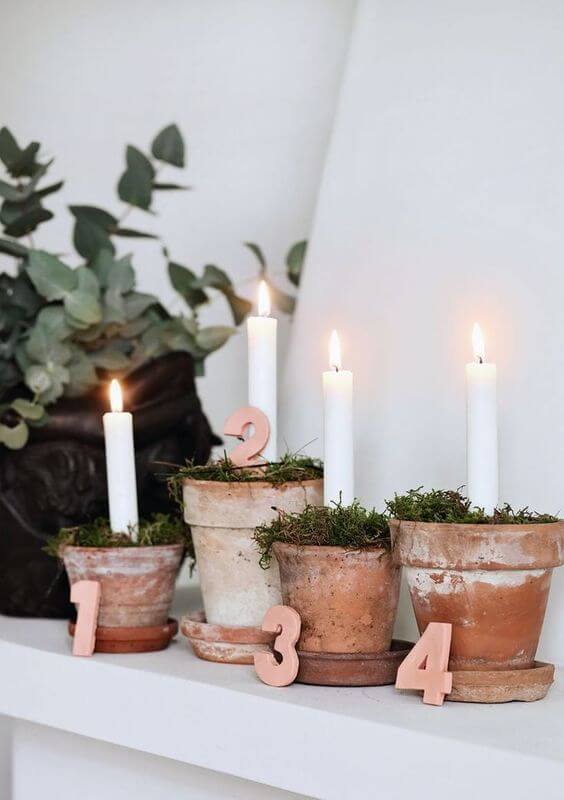 Terracotta pots transformed into candlesticks (1)