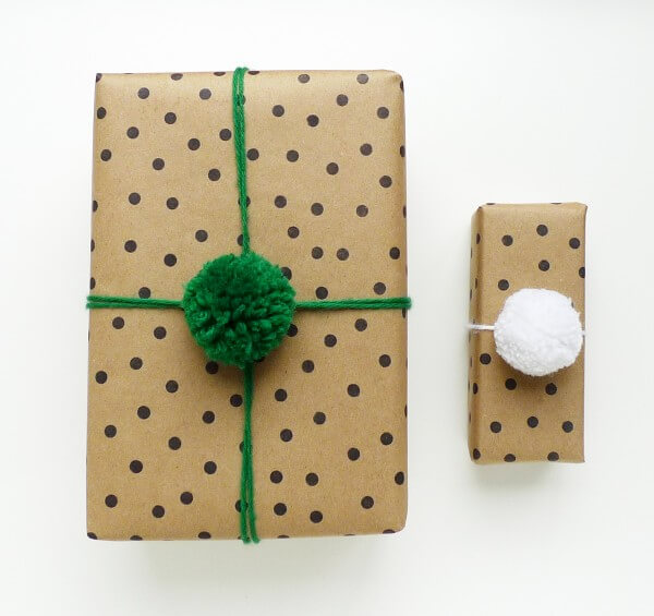 a polka-dot gift package with pom poms (1)
