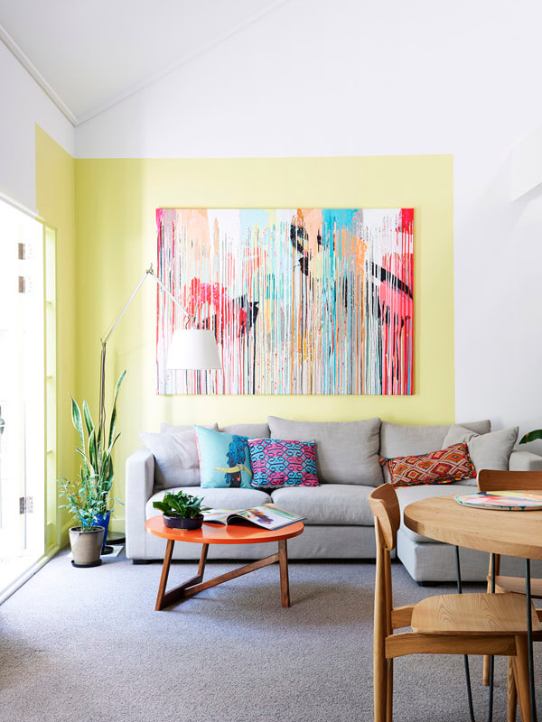 A colored wall for a small living room full of pep's (1)
