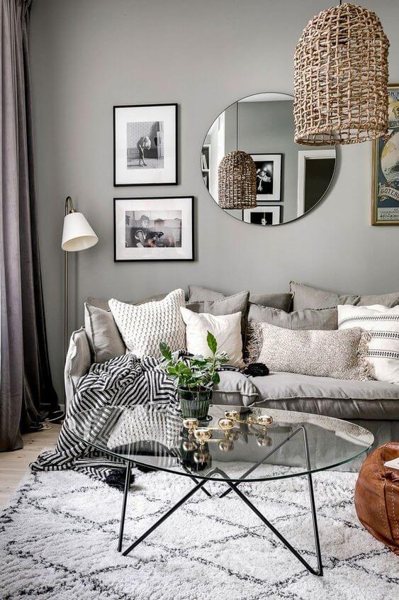 A multitude of cushions on the sofa in the Scandinavian living room
