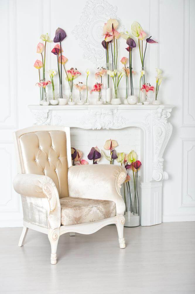 Flowers to soften a decorative fireplace (1)
