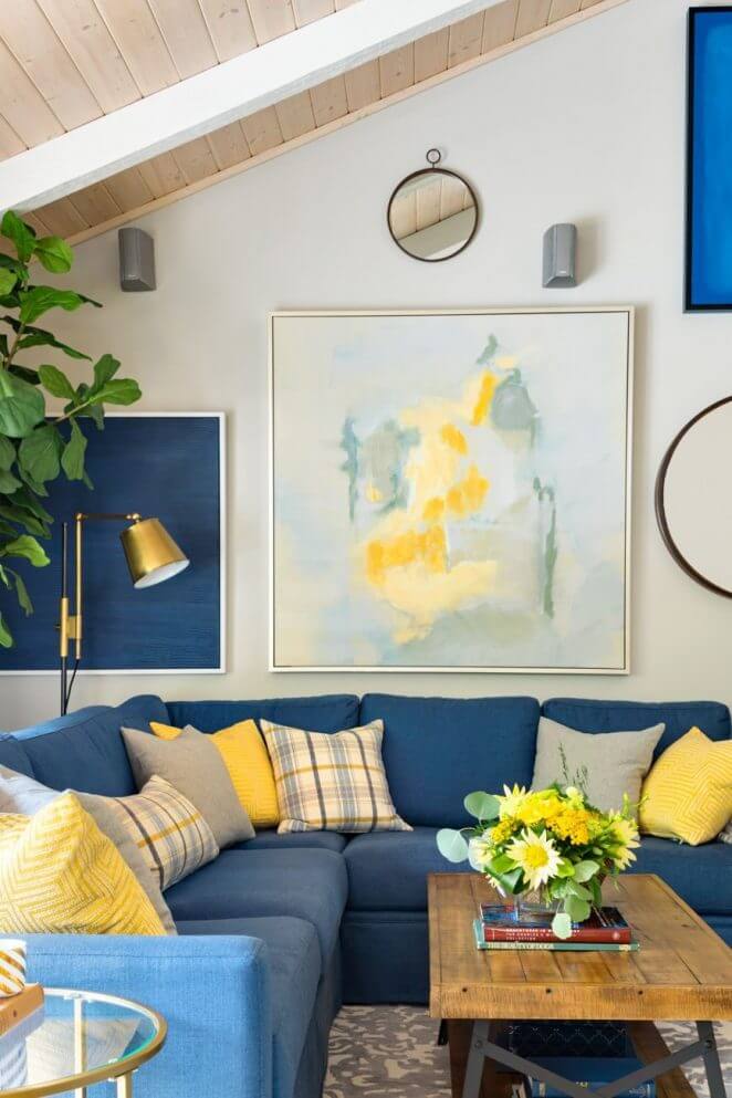 Navy blue living room with touches of yellow (1)