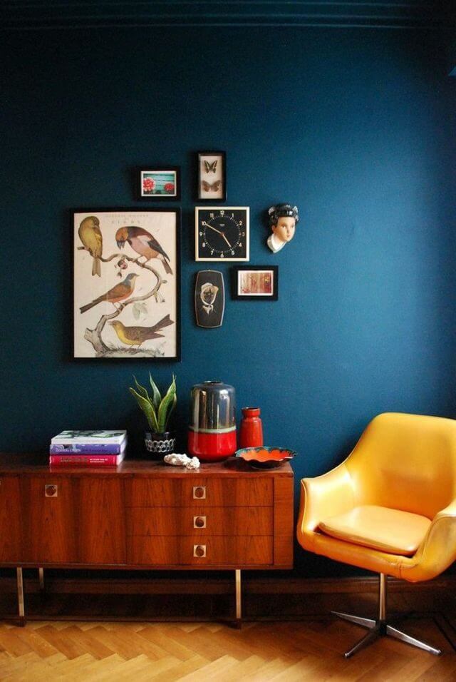 Prussian blue paint living room with yellow furniture (1)