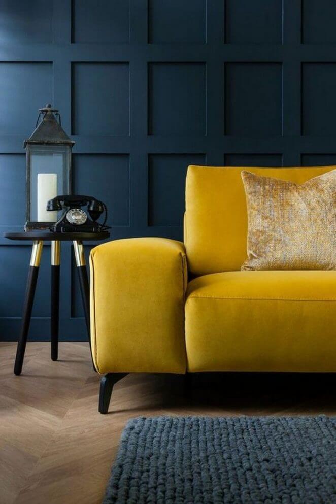Yellow sofa and deep blue walls (1)