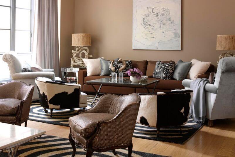 straight sofa in brown, off-white armchairs and spiral-patterned carpet (1)