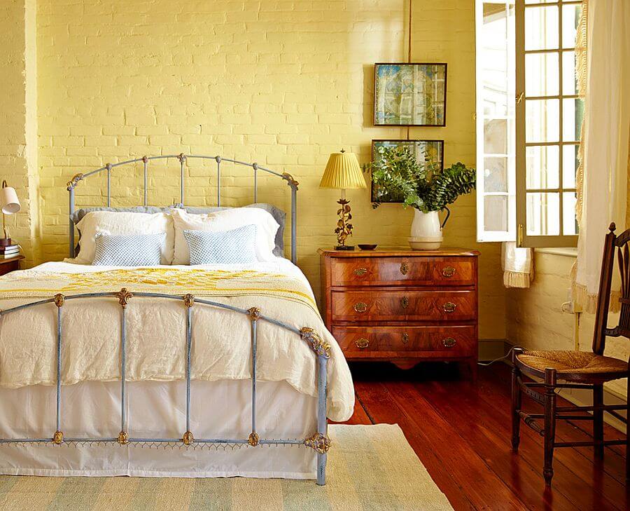A yellow colored brick wall for an eclectic bedroom (1)