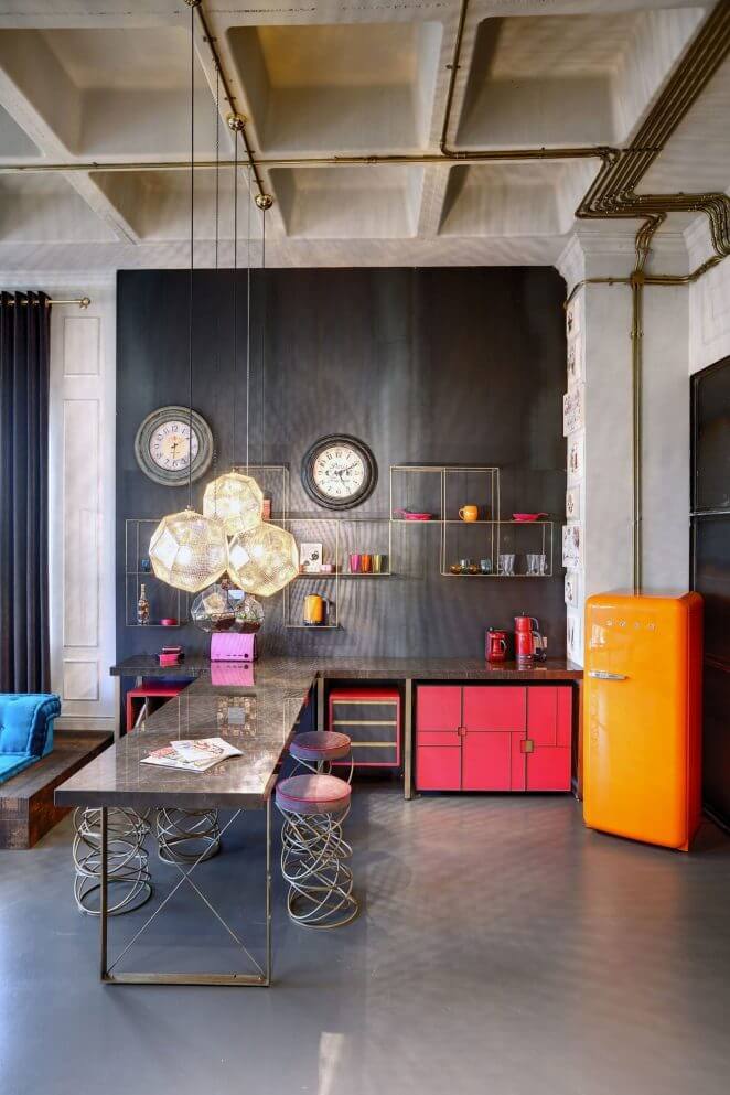 Bright colors warm an industrial interior with style (1)