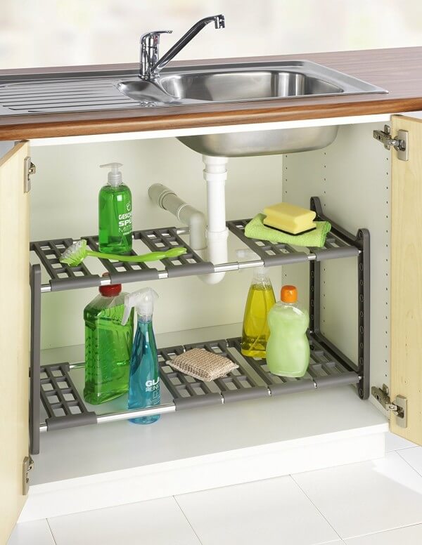 Install an adjustable and telescopic shelf under the sink (1)