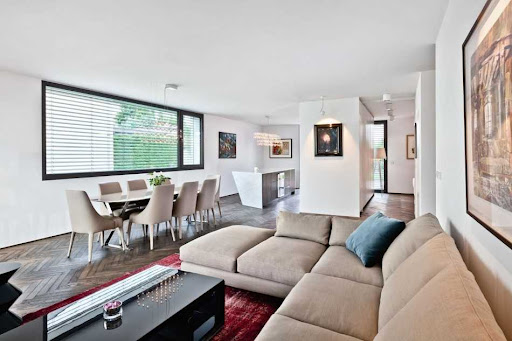 Large living room with large beige brown sofa (1)