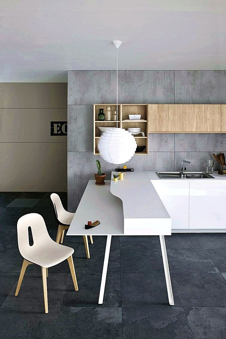 White kitchen furniture on a gray wall (1)