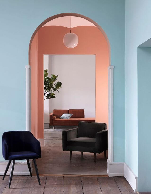 A wall colored in sky blue and salmon pink (1)