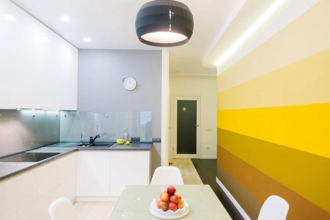 Different types of yellow on a wall of a kitchen (1)