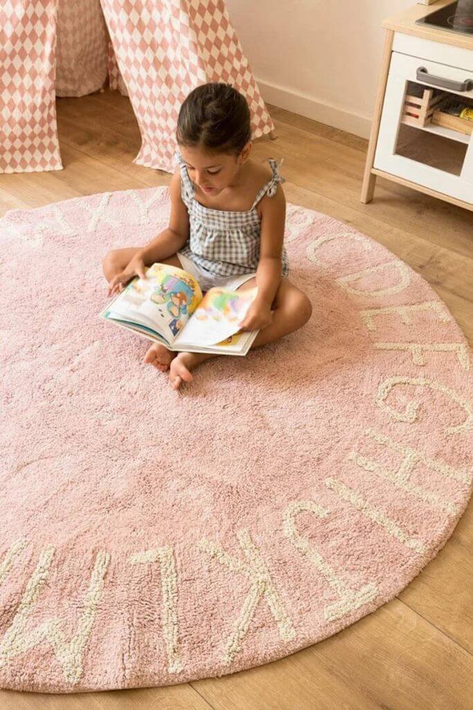 A round rug in a child's room (1)