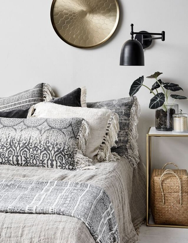 A very chic ethnic gray bedroom (1)