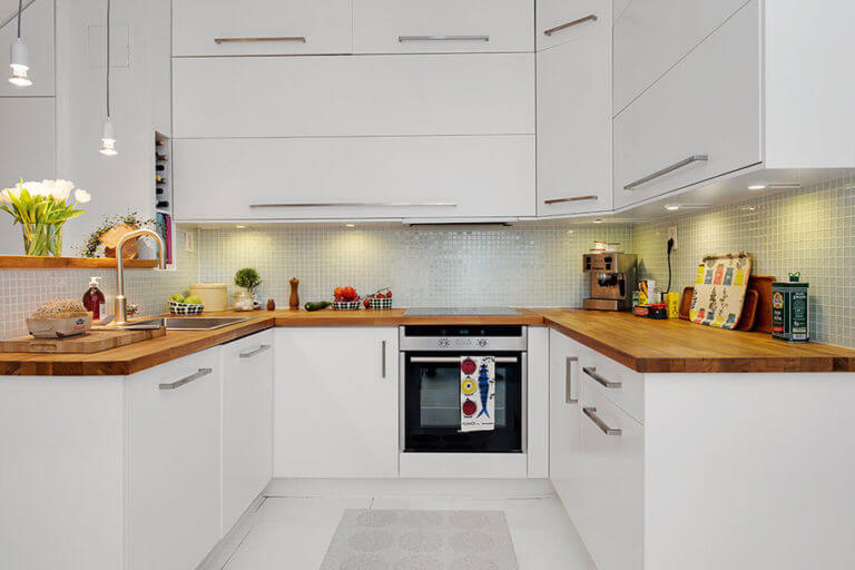 An adorable little kitchen dressed in white (1)