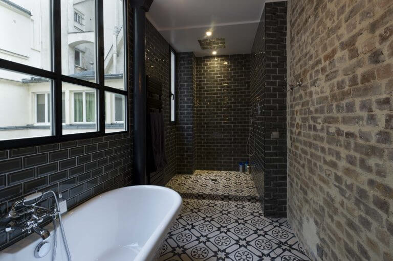 Black and white cement tiles in a bathroom (1)