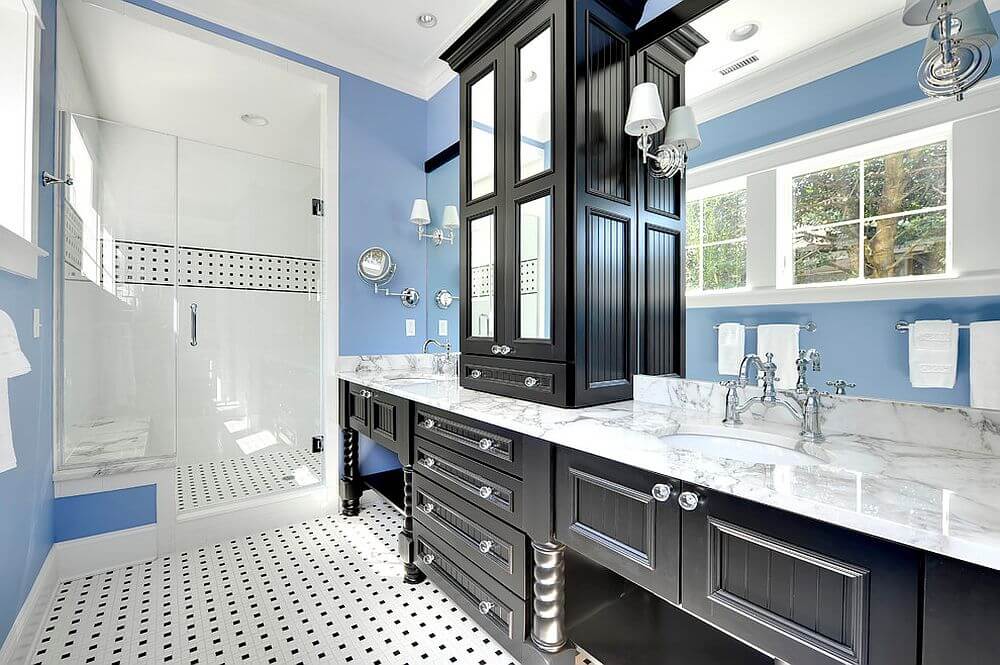 The black sink cabinet and the style of the bathroom (1)