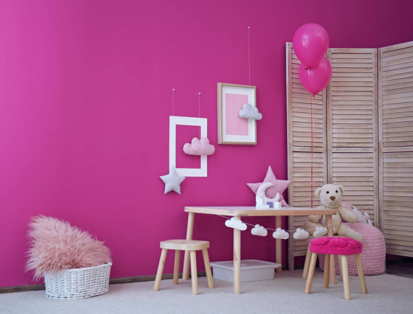 A fuchsia painted double wall in a punchy playroom1