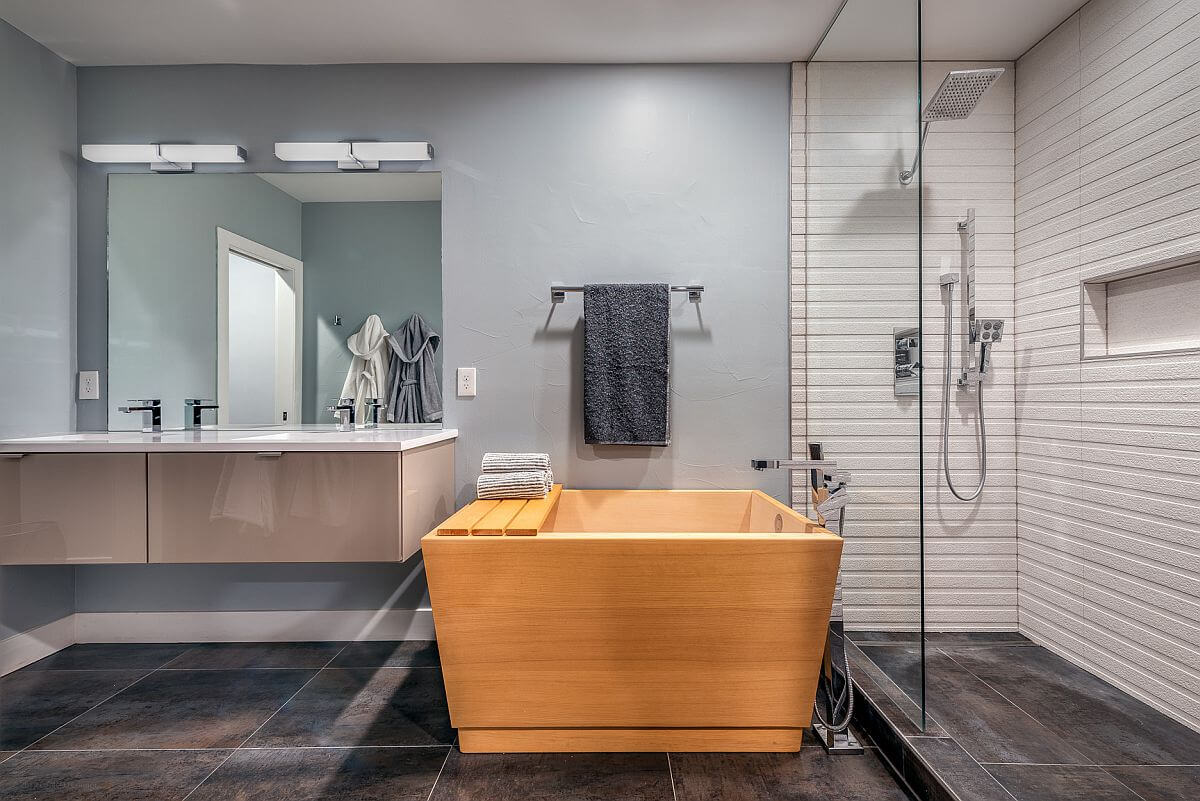 A modern gray bathroom decorated with wood (1)