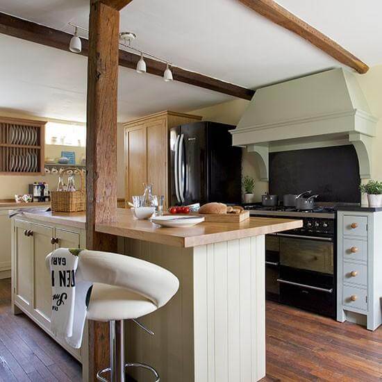 A natural kitchen with oak beams (1)