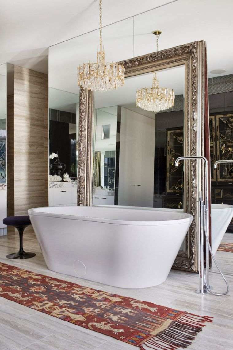 Large baroque-style golden mirror for luxurious bathroom decor