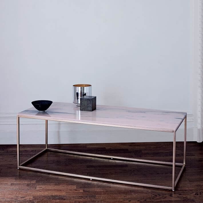11- A pink marble coffee table