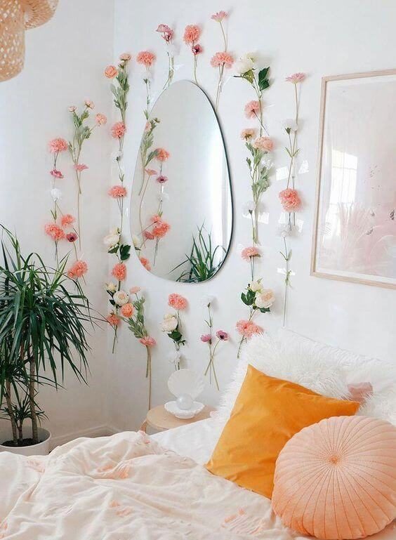 12. Artificial flowers and peach pillows
