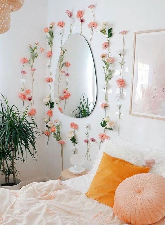 12. Artificial flowers and peach pillows