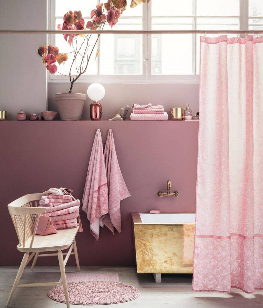 15- A pink bath mat