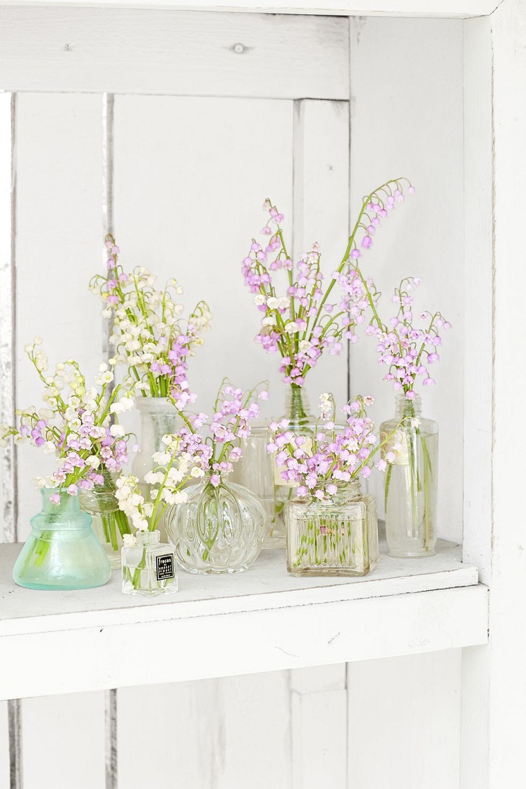 8- Spring Flower center in beautiful perfume jars 