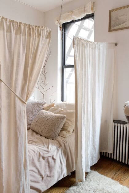 5- A simple curtain as a separation for a bohemian bedroom