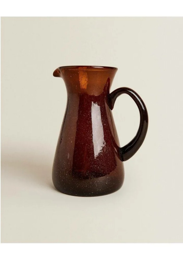 7- THIS ZARA HOME GLASS PITCHER IS PERFECT TO ADD COLOR TO YOUR TABLE