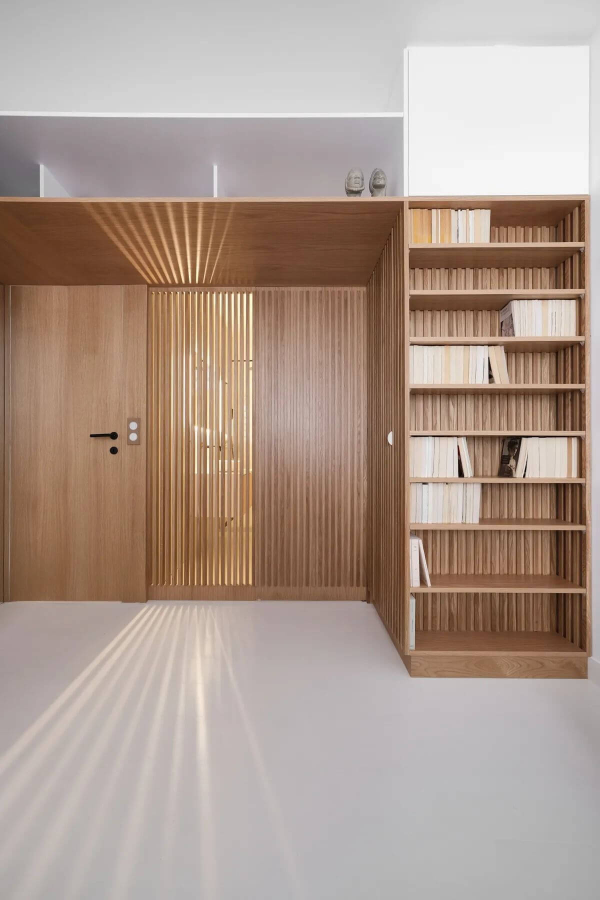 8- A wooden bookcase for a smooth hallway