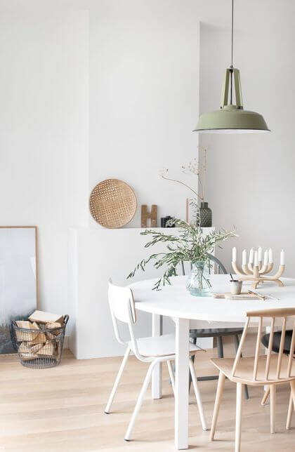 9- A white, eco-friendly, and designer dining room 