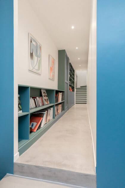 9- Low shelving for books in the hallway