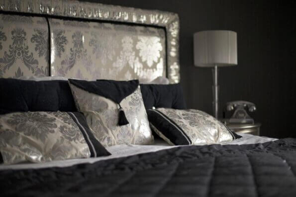 18. Prints can also appear on pillows and headboards
